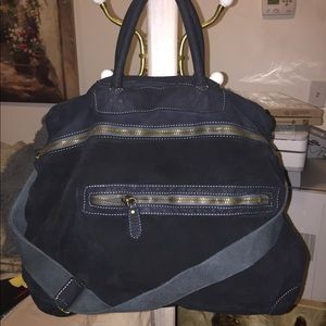One dark blue Genuine Italian leather bag